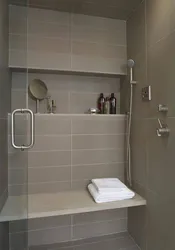 Чароғдонест, ки дар ҳаммом барои shampoos дод сафолҳои акс