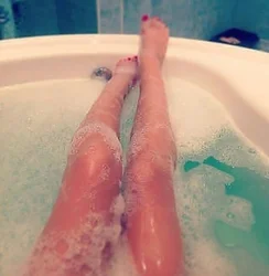Photo Of Women'S Legs In The Bathroom