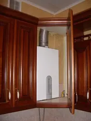 Close the gas water heater in the kitchen photo