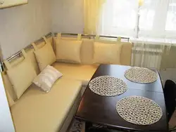 Sleeping sofa in the kitchen interior photo