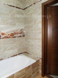 Laying Out Tiles In The Bathroom Photo