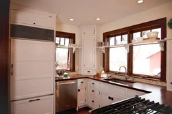 Kitchens on two walls with a window photo