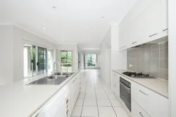 White kitchen countertop photo in the interior