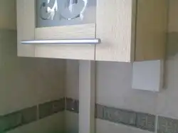 How to cover pipes in the kitchen with a kitchen set photo