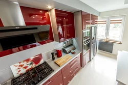 Red and white kitchen interior photo