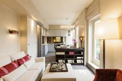 Design of a one-room studio apartment with a kitchen