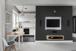 Design of a one-room studio apartment with a kitchen