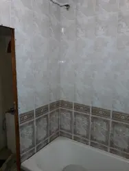 Photo of bathtub finishing panel tiles