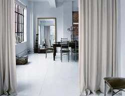 Curtains as a partition in an apartment photo