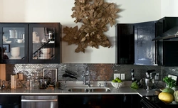 Kitchens with black tiles on the wall photo