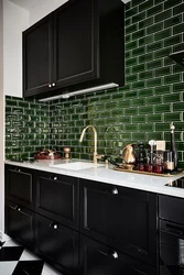 Kitchens with black tiles on the wall photo