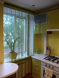 Kitchen by the window in a Khrushchev apartment photo