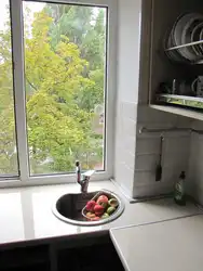 Kitchen by the window in a Khrushchev apartment photo