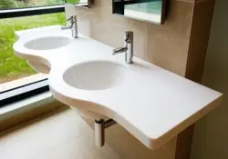 Bathroom sinks made of artificial stone photo