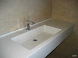 Bathroom sinks made of artificial stone photo