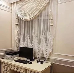 Curtains up to the window sill in the living room in a modern interior