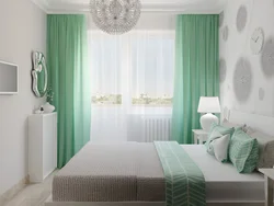 Green color of curtains in the bedroom interior