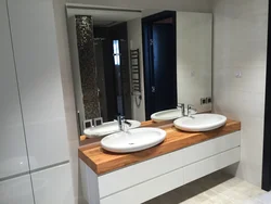 Sink on the countertop in the bathroom photo