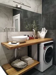 Sink on the countertop in the bathroom photo