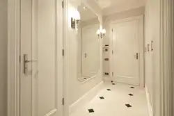 Hallway design in a house with a door