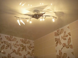 Photo of bathroom ceiling with chandelier