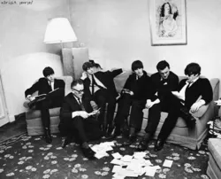 Photo of the beatles in the kitchen