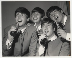 Photo of the beatles in the kitchen