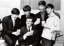 Photo of the beatles in the kitchen
