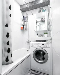 Interior Of A Bathroom With A Bathtub Without A Toilet With A Washing Machine