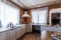 Интерьер кухни в загородном доме с одним окном фото