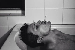 Photo of a man in the bathroom photo