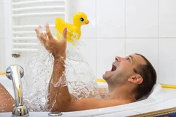 Photo of a man in the bathroom photo