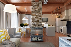 Interior Of A Combined Living Room And Kitchen In A Wooden House