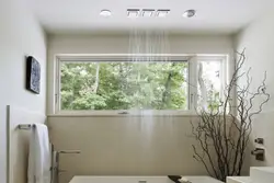 Window from the bathtub to the kitchen photo