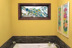 Window from the bathtub to the kitchen photo