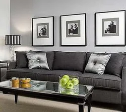 Dark gray sofa in the kitchen interior
