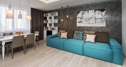 Dark gray sofa in the kitchen interior