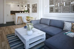 Dark gray sofa in the kitchen interior