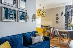 Dark gray sofa in the kitchen interior