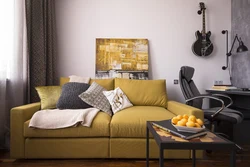 Dark gray sofa in the kitchen interior