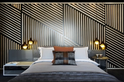 Decorative slats for walls in the bedroom interior
