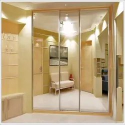 Design of built-in wardrobes in the hallway with mirrors