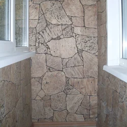 Dekorativ daş bitirmə loggia fotoşəkili