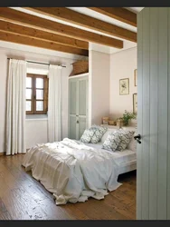 Interior of a bright bedroom in a wooden house