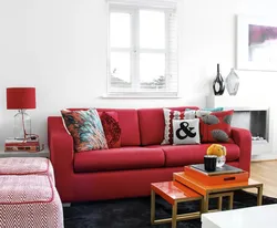 Red sofa in the living room interior