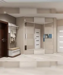 Corner wardrobe in the hallway in the interior photo design