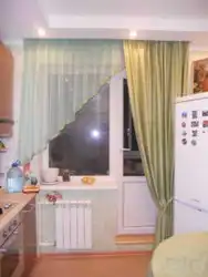 Photo of a window with a balcony in the kitchen photo