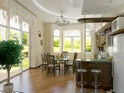 Прямоугольная кухня гостиная с выходом на террасу фото