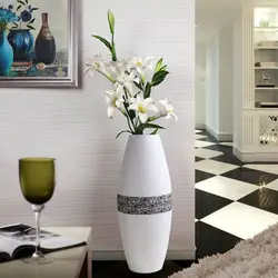 Floor vases in the living room interior photo