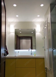 Ceiling lamps in the bathroom in the interior